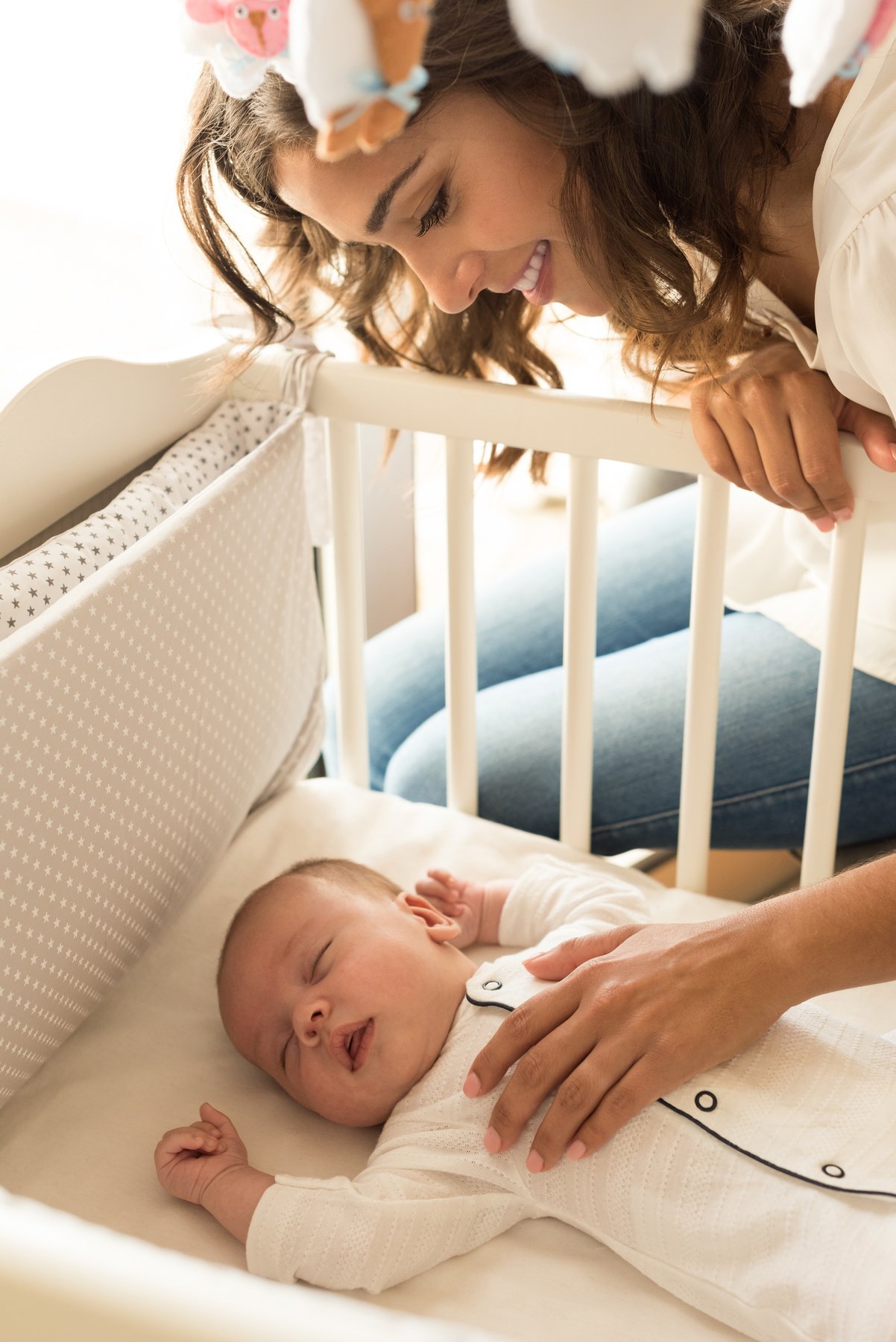 Mother Putting Baby to Sleep